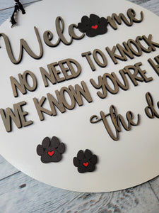 Welcome No need to knock. We know you're here. The Dogs. Door Hanger
